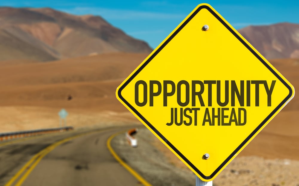 Opportunity Just Ahead sign on desert road Opportunity Just Ahead sign on desert road