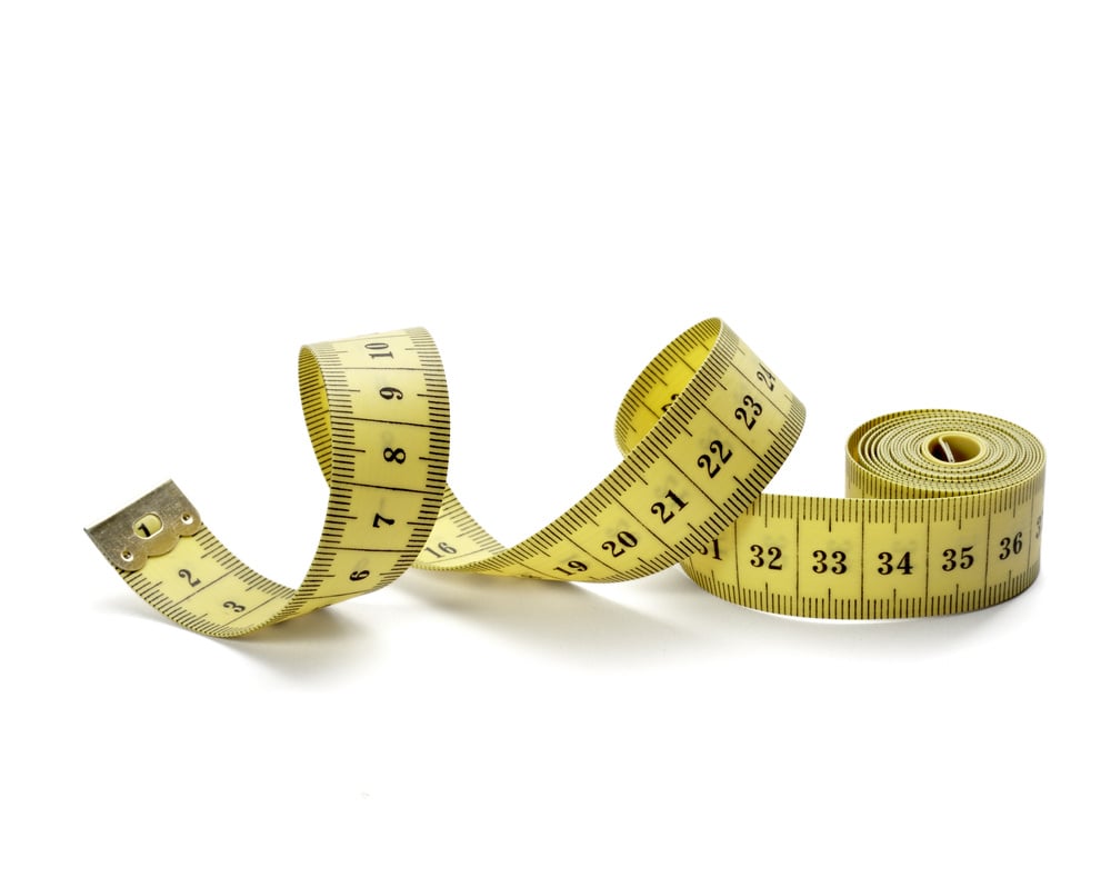 close up of measure tape on white background with clipping path close up of measure tape on white background with clipping path